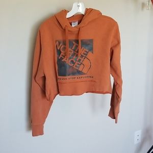 The North Face rust orange cropped hoodie